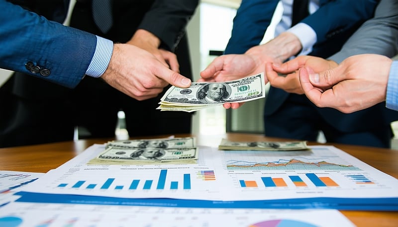 Team of financial advisors discussing cash flow management strategies. Team of financial advisors discussing cash flow management strategies.